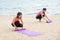 yoga student keep yoga mat after finish outdoor beach class,Healthy balance lifestyle sport concept