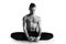 yoga teacher meditating. Yoga poses for good health. Sport, meditation and lifestyle concept. black and white photo. Peaceful Med