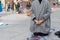 Yoga teachers protesting against the blockade and restrictions of Covid-19 in a square in Brescia, Italy. Man dressed fashion