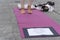 Yoga teachers protesting the Covid-19 blockade and restrictions. Female feet on the fitness mat. Written: