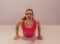 Yoga upward facing dog or gymnastics seal stretch by a young transgender girl