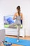 Yoga video woman training in home living room