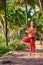 Yoga vrikshasana pose in palm forest