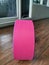 yoga wheel, pink place on wood