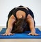 Yoga will change your life and how you live it. Shot of a young woman practicing yoga at home.