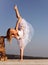 Yoga woman, ballet dancer stretching with pose stretch. Fit fitness athlete girl exercising sports stretches. Ballet