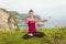 Yoga woman. Female stretch arms in lotus pose.