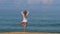 yoga woman girl doing tree pose in nature ocean outdoors