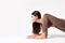 Yoga, yoga studio background with copy space. Flexible asian woman practicing yoga stretching on white.