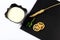 Yoghurt plate, mint leaves, slices of lemon, wheat, on a black shale board, on a white background top view, close up, set