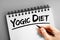 Yogic diet text on notepad, concept background