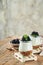 Yogurt with granola, blackberry berry fruits and muesli served in glass jar on wooden background. Healthy breakfast concept. Healt