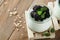 Yogurt with granola, blackberry berry fruits and muesli served in glass jar on wooden background. Healthy breakfast concept. Healt