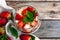 Yogurt with muesli and strawberries for healthy breakfast or snack. Strawberry dessert parfait with yogurt and granola.