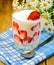 Yogurt thick with strawberries and daisies