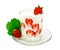 Yogurt thick with strawberries in glass on saucer