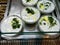 Yogurt Tzatziki Cacik with Dill, Cucumber and Olive Oil in Glass Bowls. at Showcase of Restaurant.