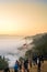 Yogyakarta,Indonesia-September 2019: People watching sunrise at the peak of Negeri di atas awan, Yogjakarta. Indonesian flag at