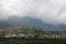 Yogyakarta village viewed on the mountain with cloudy sky