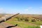 Yom Kippur War memorial at quineitra viewpoint on Golan Heights with Israeli tank turret aiming toSyria