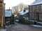 Yorkshire village of heptonstall in winter with snow covered roofs and street