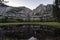 Yosemite Falls and reflection on Merced River, El Capitan Meadow, California