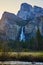 Yosemite stunning Bridalveil Falls at sunrise with layers of color