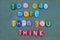You can more then you think, motivational phrase composed with multi colored stone letters