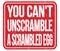 YOU CAN`T UNSCRAMBLE A SCRAMBLED EGG, words on red stamp sign