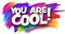 You are cool paper word sign with colorful spectrum paint brush strokes over white