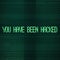 You have been hacked inscription over binary code stream background