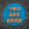 You Are Here, Sign Painted on Pavement