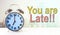 You are late text with blue alarm clock city