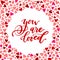 You are loved calligraphic phrase surrounded by colorful heart pattern