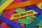 You matter text on yellow wooden stick - Inspirational concept