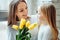 You are my Everything.Little girl gives mom flowers