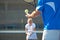 You ready for this. Cropped image of a man bouncing a tennis ball in his hand before a service.