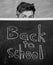 Are you ready study. Teacher or school principal welcomes inscription back to school. Educator hiding behind blackboard