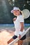 Are you ready to play. Portrait of sexy gorgeous woman in sports clothing holding tennis racket