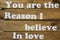 You are the reason I believe in love text on wooden board
