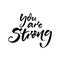 You are strong. Motivational quote for posters and social media. Black brush script calligraphy isolated on white