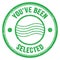 YOU`VE BEEN SELECTED text on green round postal stamp sign