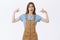 You will regret what miss. Portrait of confident proud and arrogant stylish caucasian female in brown overalls and blue