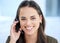 You wont have to hold the line while Im here. Portrait of a young businesswoman using a headset in a modern office.