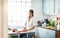 Youll never regret a healthy meal. a young woman preparing a healthy meal at home.