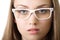 Yound business woman in glasses close-up isolated