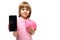 Young aattractive boy with a phone with a pink piggy bank mockup on a white background with copy space