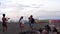 Young active people enjoy playing volleyball on the sandy shore of cheap resort beaches