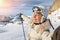 Young adult beautiful happy attractive caucasian smiling skier woman portrait making selfie on mountain peak showing