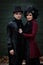 Young adult couple dressed in old fashioned vampire style clothes
